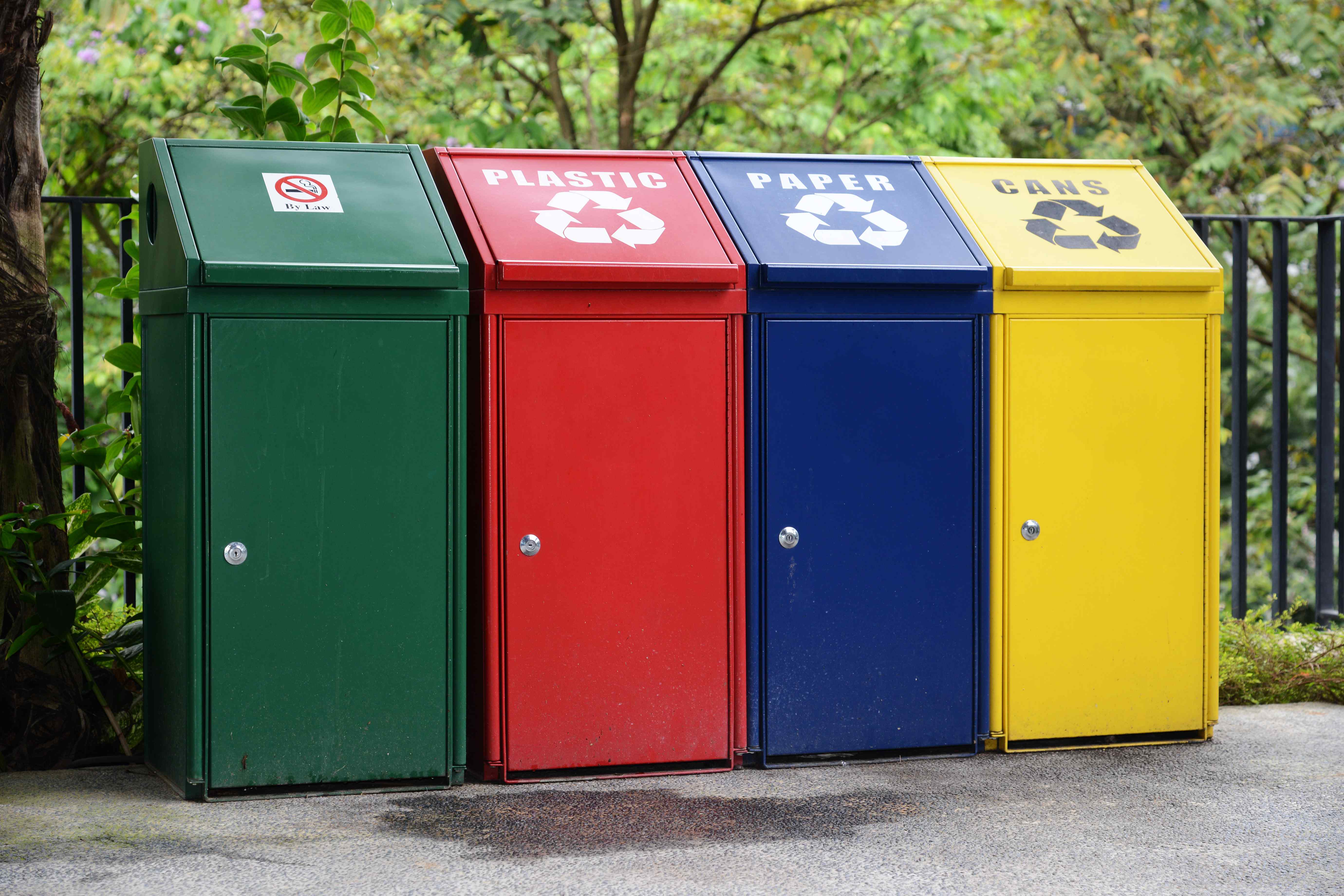 Multicolored trash and recycling bins