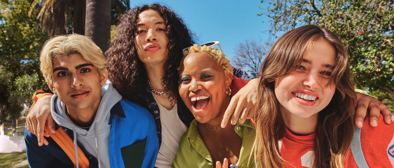 friends smiling at camera