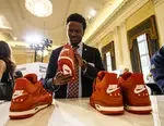Man looking at sneakers